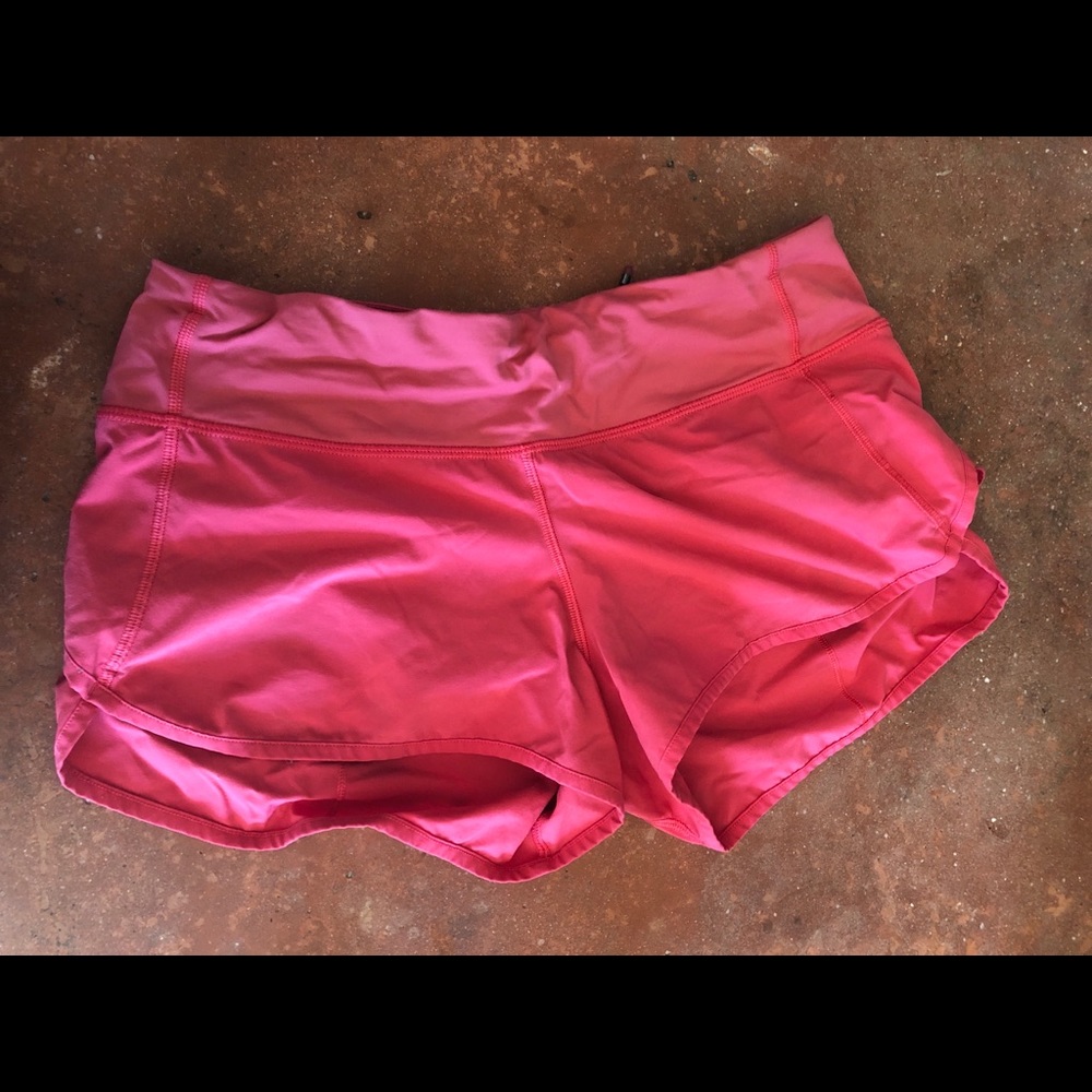 Pink Lululemon running shorts